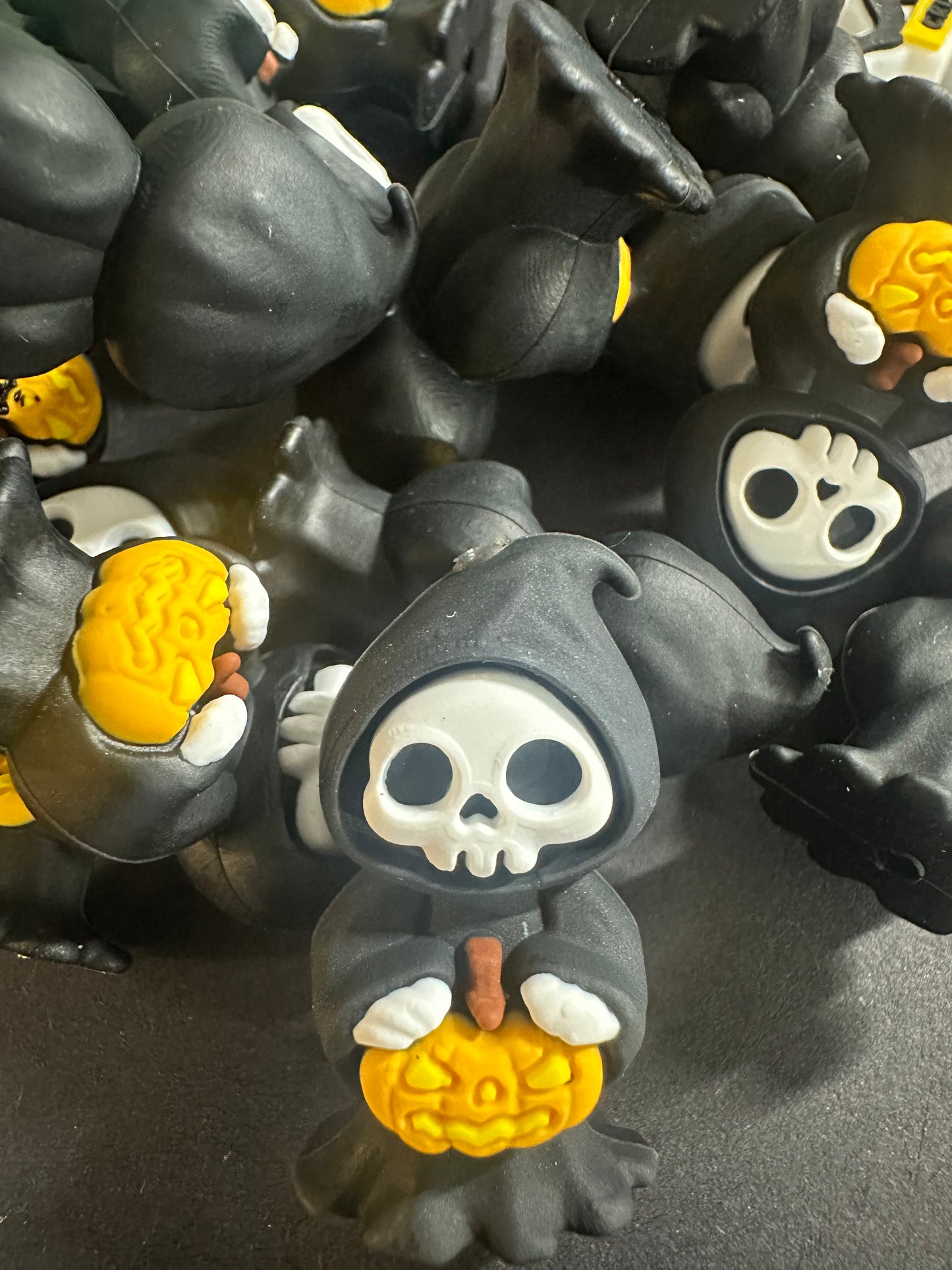 3d grim reaper holding a pumpkin focal bead